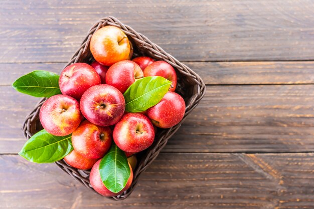 Red apple in basket