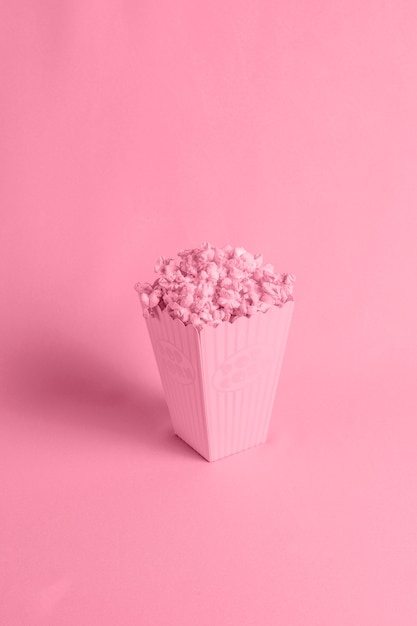 Red background with isometric popcorn