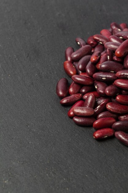 Red beans on the black table