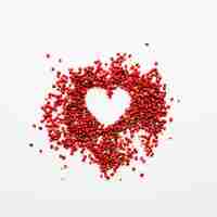 Free photo red berries forming heart