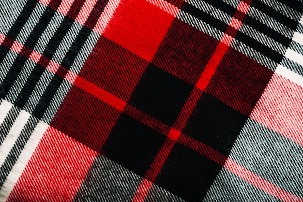 Free photo red and black checkered woolen textile