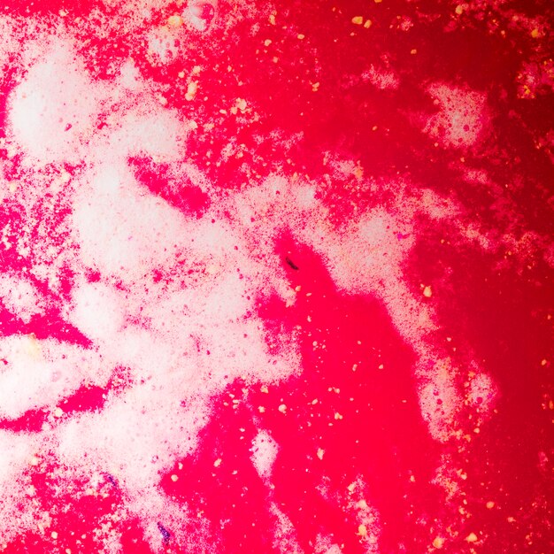 Red bubbles on the surface of fizzy bathbomb