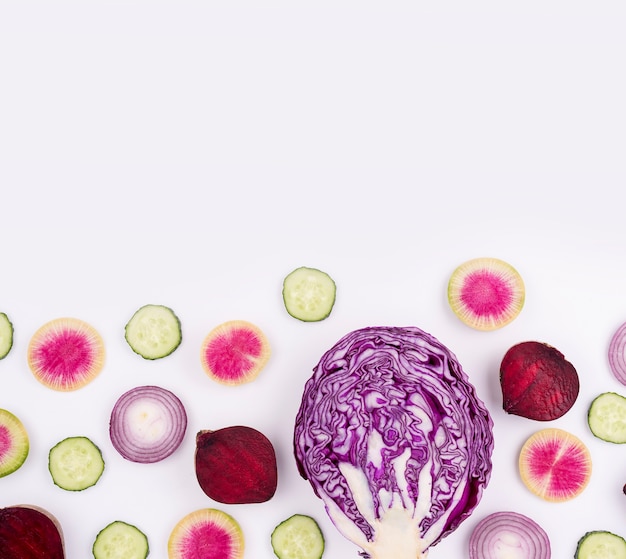 Red cabbage and cucumber slices with copy space