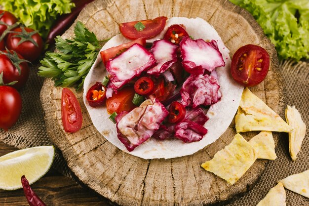 Red cabbage dish on wooden plate