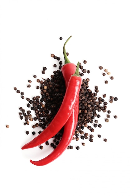 Red chili peppers and peppercornss and peppercorns