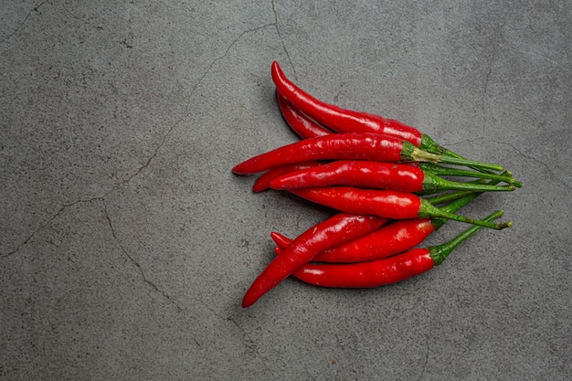 Red chilli paste on black.