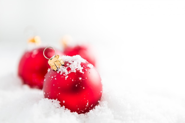 Red christmas balls with snow