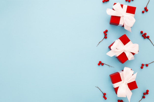 Red christmas gifts with white ribbon