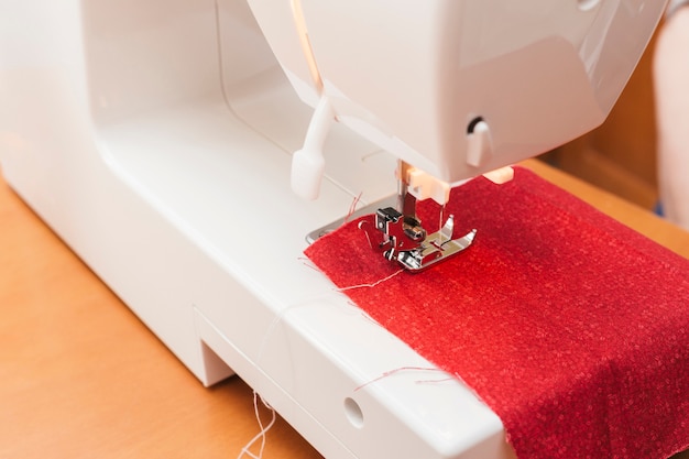 Red cloth on sewing machine