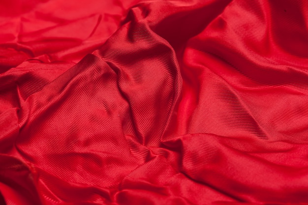 붉은 천으로 파도 배경 텍스처 프리미엄 사진