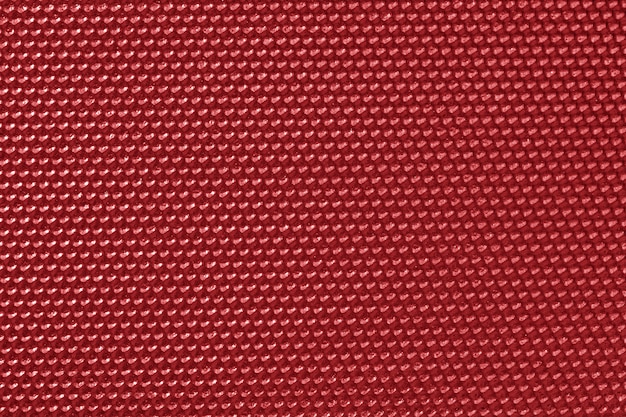 Free photo red colored honeycomb pattern wallpaper