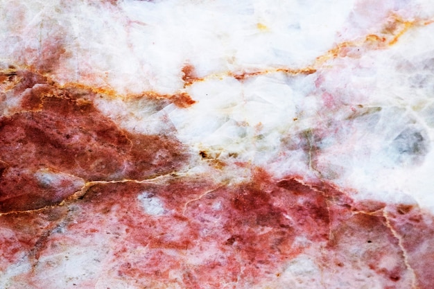 Free photo red cracked marble textured background