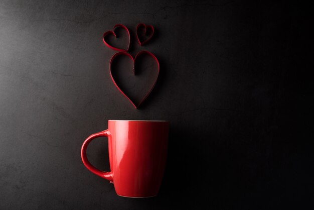 Red cup with heart, valentine’s day concept