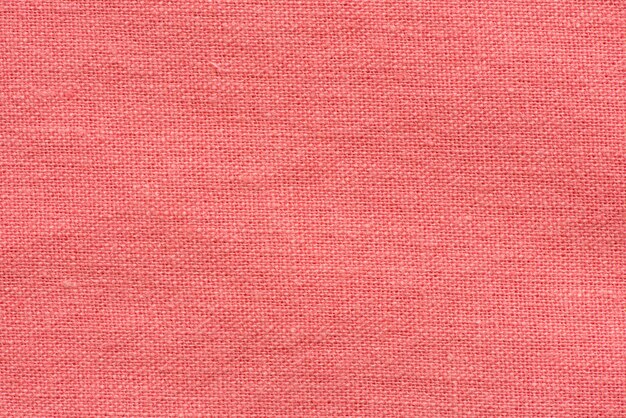 Red fabric canvas macro shot as texture or background