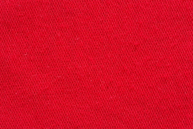 Red fabric canvas macro shot as texture or background