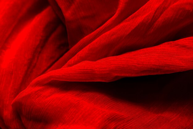 Red fabric material texture with copy space