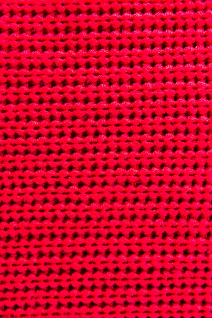 Free photo red fibers with knitted pattern