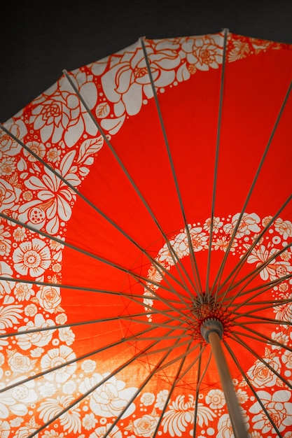 Red floral wagasa umbrella in studio