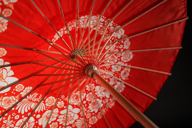 Red floral wagasa umbrella in studio