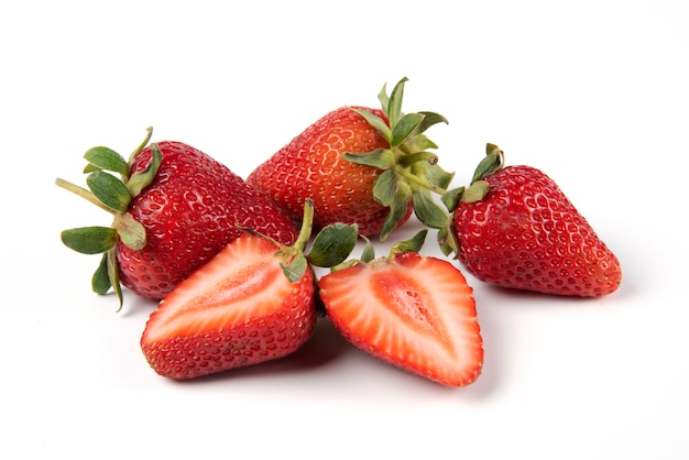 Red fresh strawberries with green leaves