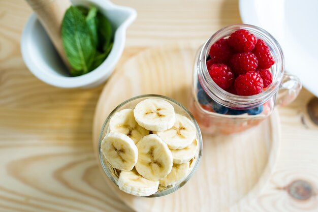 Red fruits, banana and mint.