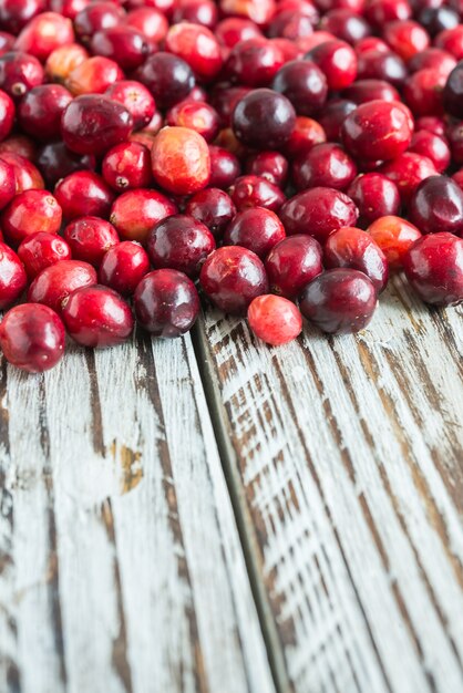 Red fruits on a wooden table