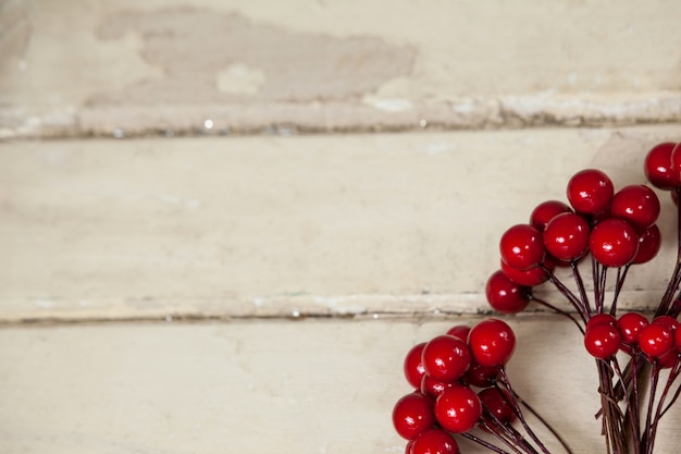 Free photo red fruits on a wooden table