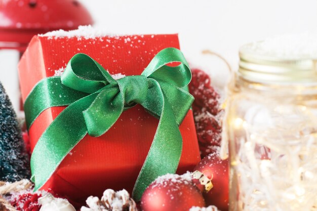 Red gift with green bow