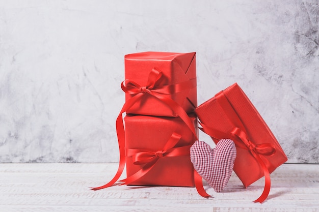 Red gifts with hearts next to each other