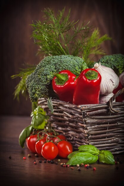 Red and green vegetable on wood