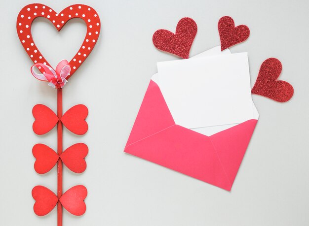 Free photo red heart on stick with envelope