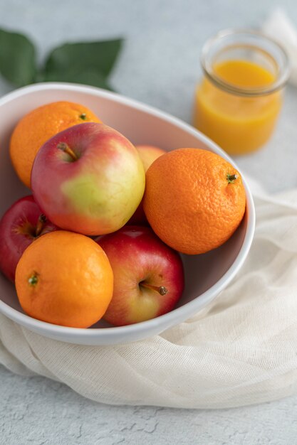 Red honeycrisp apple and orange fruits