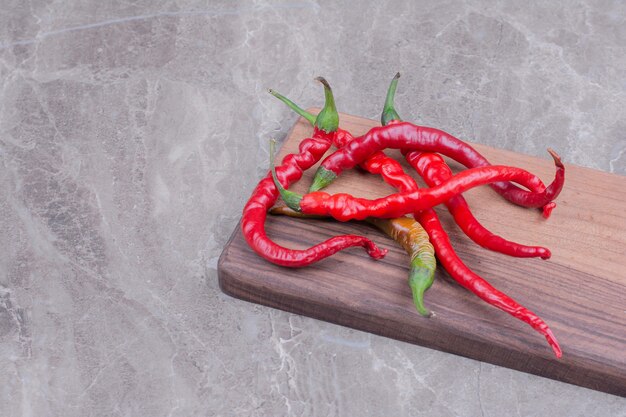 Red hot chili peppers on marble.