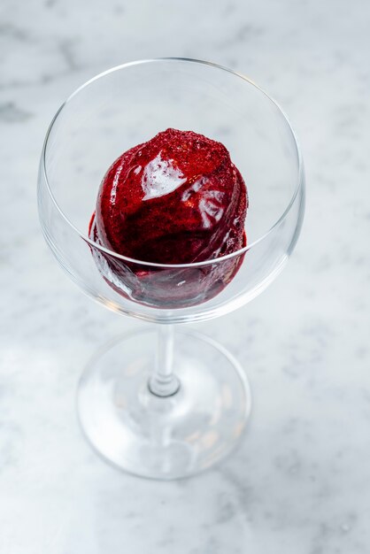 Red ice cream served in glass