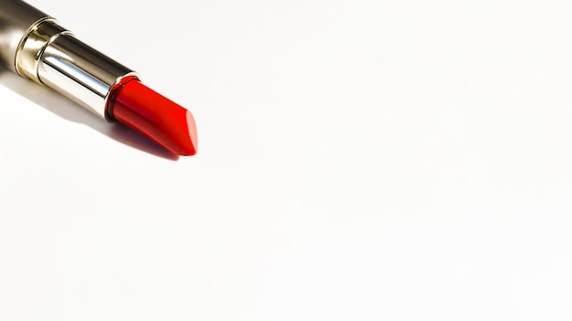 Red lipstick on white background