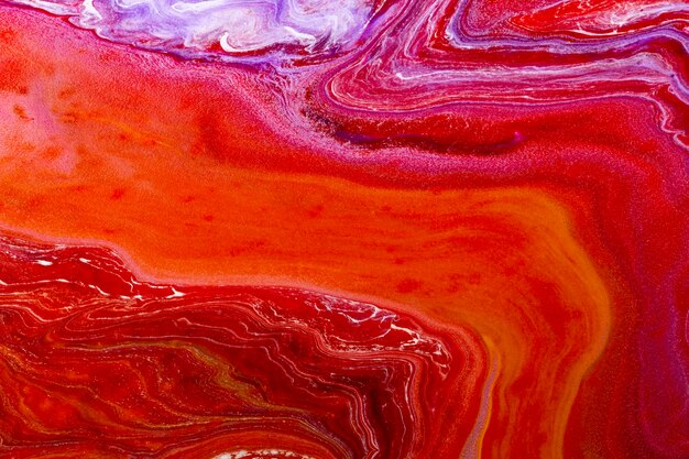 Red marble swirl background handmade abstract flowing texture experimental art