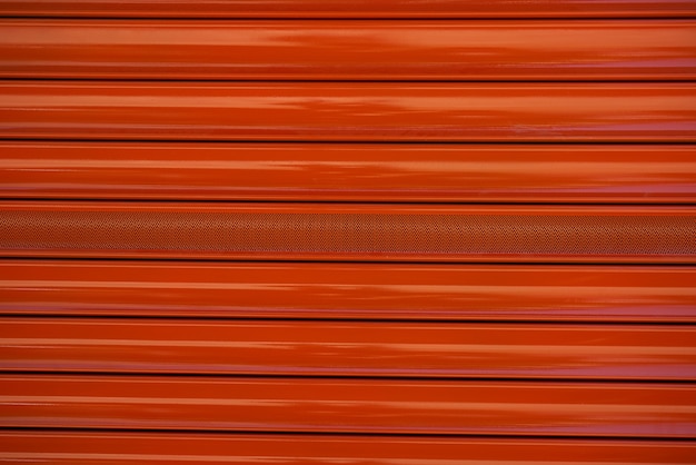 Red metal roller door