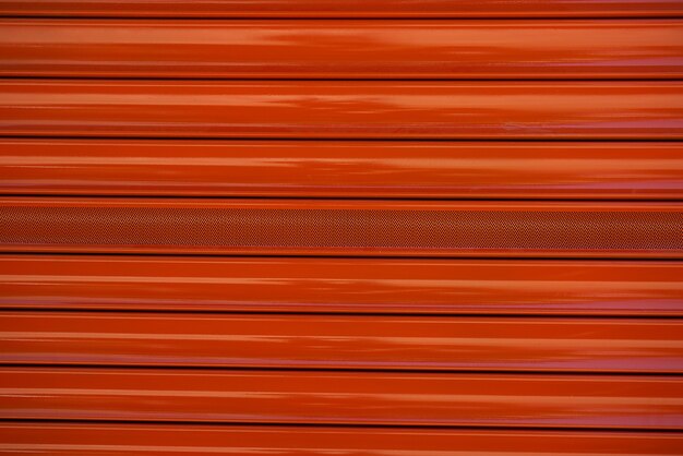 Red metal roller door