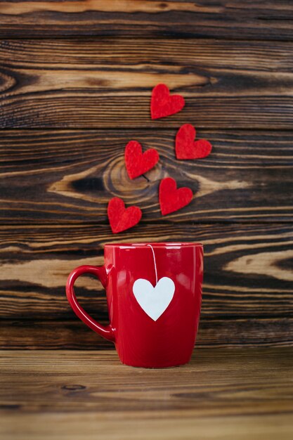 Red mug with heart shaped teabag tag