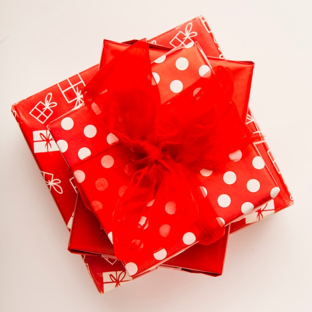 Red New Year presents on white background