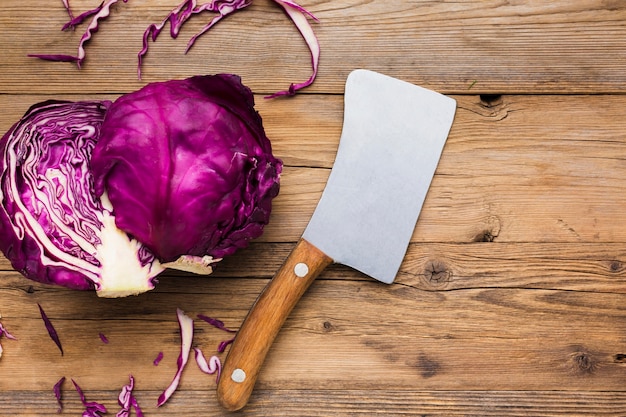 Red onion on wooden background