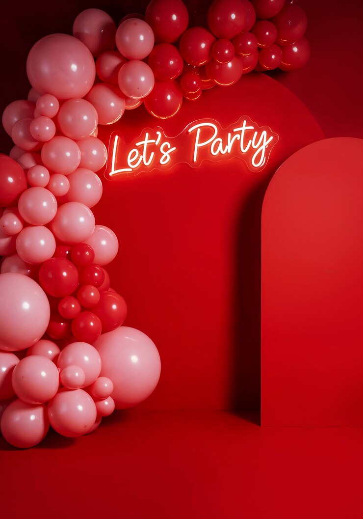 Free Photo red party with balloons and neon sign