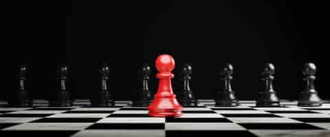 Free photo red pawn chess stepped out of line to leading black chess and show different thinking ideas business technology change and disruption for new normal concept