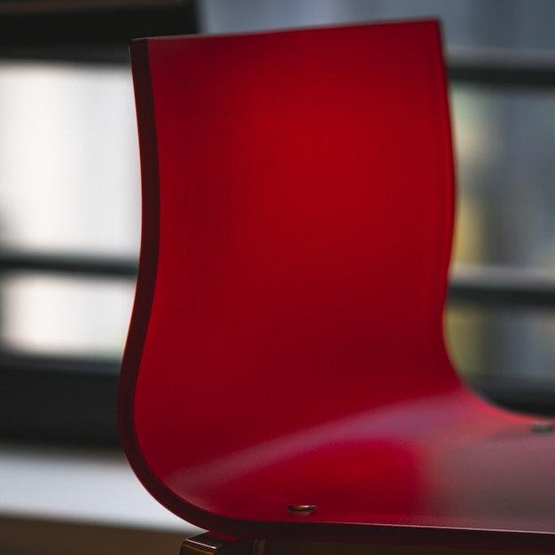 Red plastic chair close up