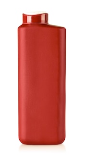 Red plastic shampoo bottle isolated on a white background