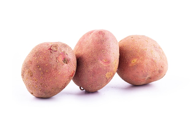 Free photo red potatoes on white background
