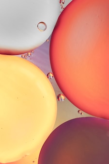 Red purple and yellow abstract background with bubbles