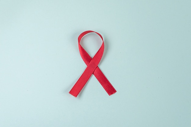 Red ribbon on green background