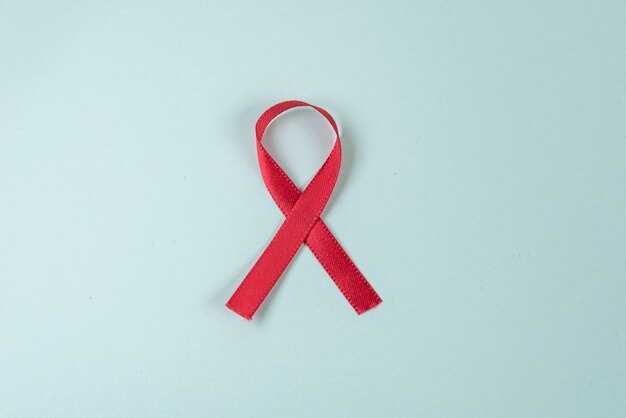 Red ribbon on green background