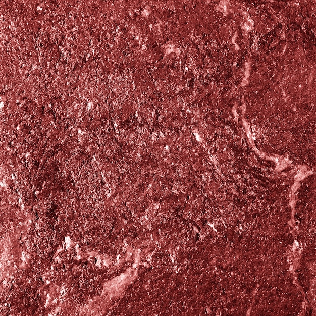 Free photo red shiny textured paper background